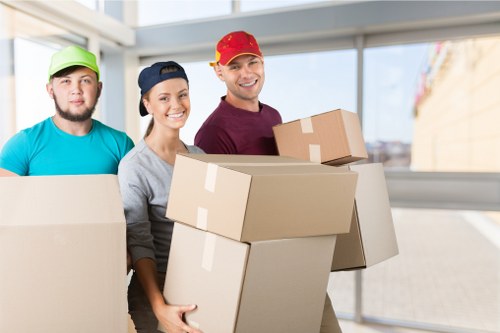 Packed boxes and furniture ready for collection on a Collierswood move