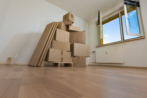 Trained movers handling furniture during local removals in Collierswood